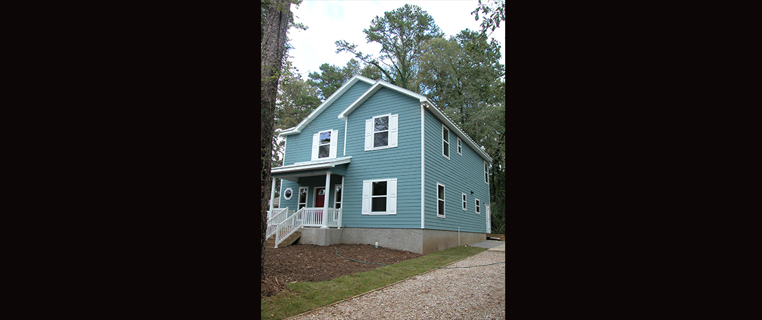 2 story blue house with siding, 1st home cerrified Green, very energy efficient