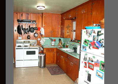 view of old kitchen, vinyl flooring, green countertops and back splash