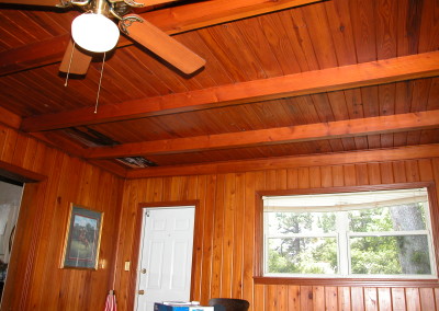 Original flat ceiling, sagging beams, wood rot shows on ceiling